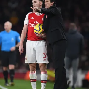 Strategic Discussions: Unai Emery and Kieran Tierney at Arsenal's Emirates Stadium Strategic Discussions: Unai Emery and Kieran Tierney at Arsenal's Emirates Stadium
