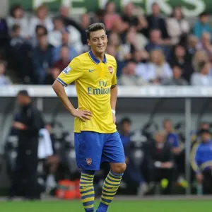 SWANSEA, WALES - SEPTEMBER 28: Mesut Ozil of Arsenal during the Swansea v Arsenal Premier Leageu match at Liberty SWANSEA, WALES - SEPTEMBER 28: Mesut Ozil of Arsenal during the Swansea v Arsenal Premier Leageu match at Liberty