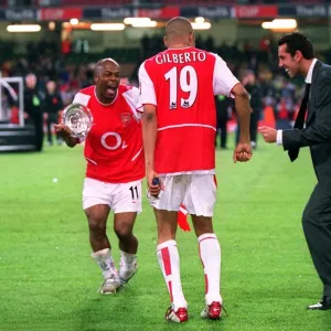 Sylvain Wiltord, Gilberto and Edu celebrate after the match Sylvain Wiltord, Gilberto and Edu celebrate after the match