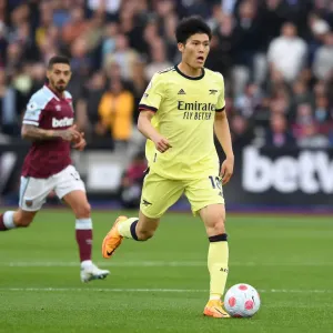 Takehiro Tomiyasu in Action: West Ham United vs. Arsenal, Premier League 2021-22