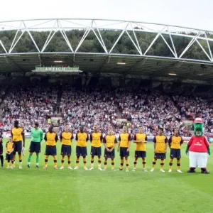 The teams line up before the match The teams line up before the match