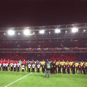 The two teams line up before the match The two teams line up before the match