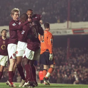 Theirry Henry celebrates scoring Arsenals 1st goal with Kerrea Gilbert and Alex Hleb