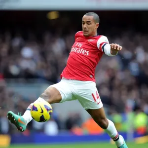 Theo Walcott in Action: Arsenal vs. Tottenham Premier League Clash 2012-13 Theo Walcott in Action: Arsenal vs. Tottenham Premier League Clash 2012-13