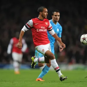 Theo Walcott in Action: Arsenal vs Olympique de Marseille, UEFA Champions League (2013) Theo Walcott in Action: Arsenal vs Olympique de Marseille, UEFA Champions League (2013)