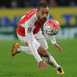 Theo Walcott in Action: Arsenal's FA Cup Battle against Hull City (March 2016) Theo Walcott in Action: Arsenal's FA Cup Battle against Hull City (March 2016)