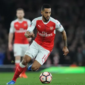 Theo Walcott in Action: Thrilling Arsenal Quarter-Final Clash against Lincoln City Theo Walcott in Action: Thrilling Arsenal Quarter-Final Clash against Lincoln City