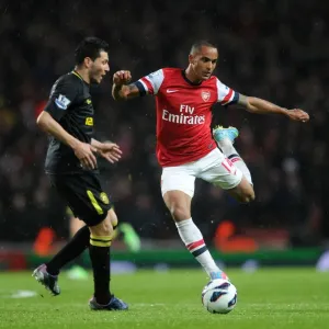 Theo Walcott (Arsenal) Antolin Alcaraz (Wigan). Arsenal 4: 1 Wigan Athletic. Barclays Premier League