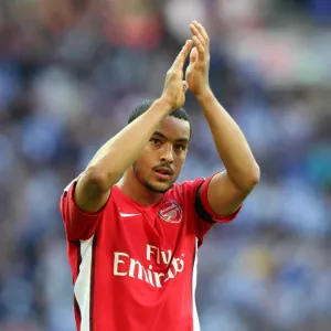 Theo Walcott (Arsenal) claps the fans after the match