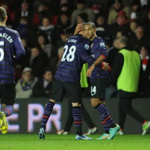 Theo Walcott (Arsenal) is congratulated on the cross that lead to the Arsenal goal Theo Walcott (Arsenal) is congratulated on the cross that lead to the Arsenal goal