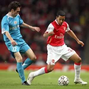Theo Walcott (Arsenal) Csaba Feher (PSV) Theo Walcott (Arsenal) Csaba Feher (PSV)