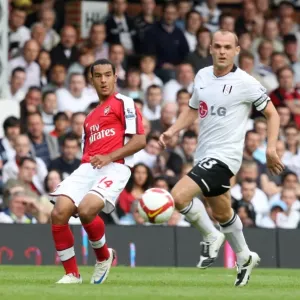 Theo Walcott (Arsenal) Danny Murphy (Fulham) Theo Walcott (Arsenal) Danny Murphy (Fulham)