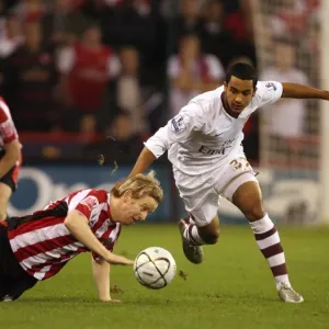 Theo Walcott (Arsenal) David Carney (Sheff) Theo Walcott (Arsenal) David Carney (Sheff)
