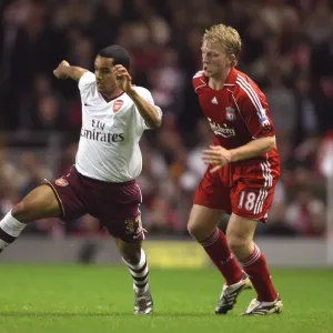 Theo Walcott (Arsenal) Dirk Kuyt (Liverpool) Theo Walcott (Arsenal) Dirk Kuyt (Liverpool)