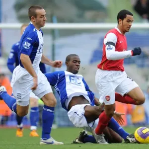 Theo Walcott (Arsenal) Fabrice Muamba and Stephen Murphy (Birmingham City) Theo Walcott (Arsenal) Fabrice Muamba and Stephen Murphy (Birmingham City)