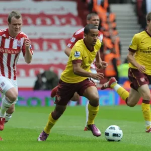 Theo Walcott (Arsenal) Glen Whelan (Stoke). Stoke City 3: 1 Arsenal. Barclays Premier League