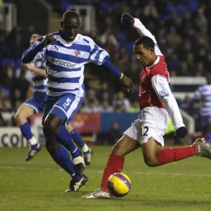 Theo Walcott (Arsenal) Ibrahima Sonko (Reading) Theo Walcott (Arsenal) Ibrahima Sonko (Reading)