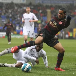 Theo Walcott (Arsenal) JLloyd Samuel (Bolton) Theo Walcott (Arsenal) JLloyd Samuel (Bolton)