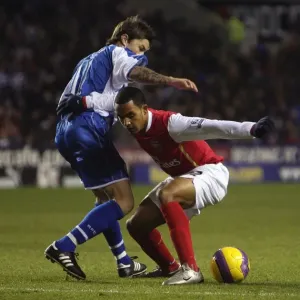 Theo Walcott (Arsenal) John Oster (Reading) Theo Walcott (Arsenal) John Oster (Reading)