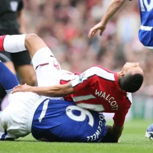 Theo Walcott (Arsenal) with Liam Ridgewell (Birmingham)