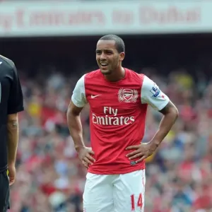 Theo Walcott (Arsenal) Martin Petrov (Bolton). Arsenal 3: 0 Bolton Wanderers Theo Walcott (Arsenal) Martin Petrov (Bolton). Arsenal 3: 0 Bolton Wanderers