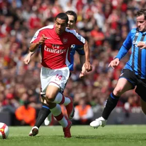 Theo Walcott (Arsenal) Matthew Bates (Middlesbrough) Theo Walcott (Arsenal) Matthew Bates (Middlesbrough)
