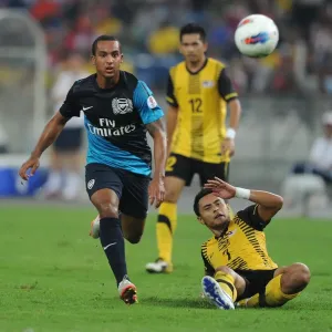 Theo Walcott (Arsenal) Mohd Zafuan (Malaysia). Malaysia XI 0: 4 Arsenal