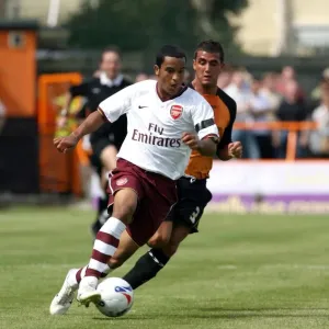 Theo Walcott (Arsenal) Nicky Nicolau (Barnet) Theo Walcott (Arsenal) Nicky Nicolau (Barnet)