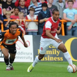 Theo Walcott (Arsenal) Sam Cox (Barnet). Barnet 0: 4 Arsenal, Pre season friendly Theo Walcott (Arsenal) Sam Cox (Barnet). Barnet 0: 4 Arsenal, Pre season friendly