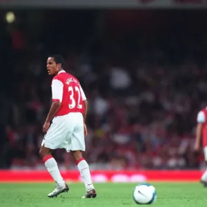 Theo Walcott (Arsenal) is shown the Yellow card by the referee Theo Walcott (Arsenal) is shown the Yellow card by the referee