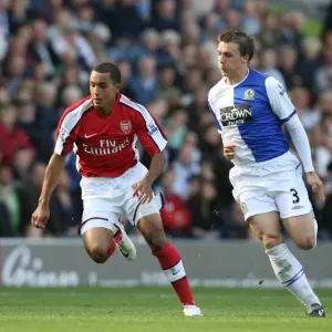 Theo Walcott (Arsenal) Stephen Warnock and Ryan Nelson (Blackburn) Theo Walcott (Arsenal) Stephen Warnock and Ryan Nelson (Blackburn)