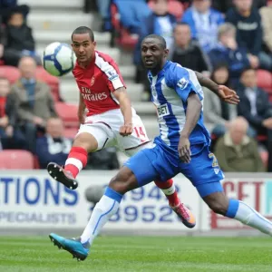 Theo Walcott (Arsenal) Steve Gohouri (Wigan). Wigan Athletic 3: 2 Arsenal