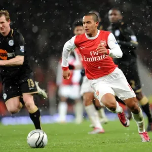 Theo Walcott (Arsenal) Steven Caldwell (Wigan). Arsenal 2: 0 Wigan Athletic