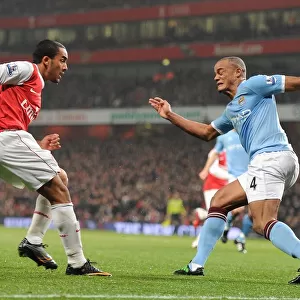 Theo Walcott (Arsenal) Vincent Kompany (Man City). Arsenal 0: 0 Manchester City
