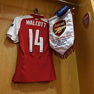 Theo Walcott and Arsenal's Europa League Victory Pennant: Arsenal FC's Triumph over Red Star Belgrade (2017)