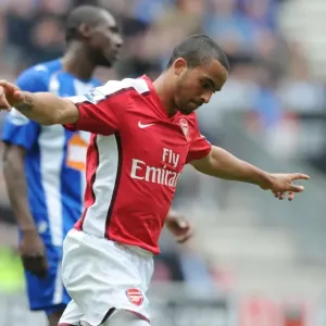 Theo Walcott celebrates scoring the 1st Arsenal goal. Wigan Athletic 3: 2 Arsenal