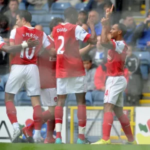 Theo Walcott celebrates scoring the 1st Arsenal goal with Abou Diaby, Cesc Fabregas