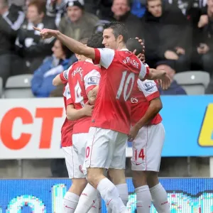 Theo Walcott celebrates scoring the 1st Arsenal goal with Cesc Fabregas
