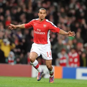 Theo Walcott celebrates scoring the 1st Arsenal goal Print