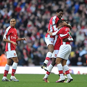 Theo Walcott celebrates scoring the 2nd Arsenal goal with Emmanuel Eboue