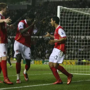 Theo Walcott celebrates scoring the 4th Arsenal goal with Emmanuel Adebayor