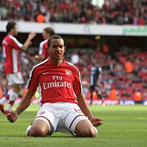 Theo Walcott celebrates scoring the 5th Arsenal goal