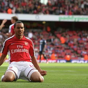 Theo Walcott celebrates scoring the 5th Arsenal goal