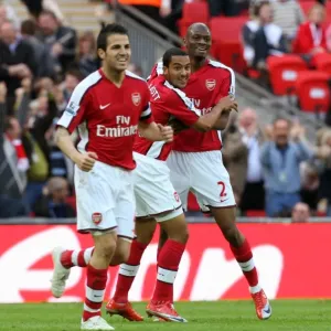 Theo Walcott celebrates scoring Arsenals goal with Theo Walcott celebrates scoring Arsenals goal with