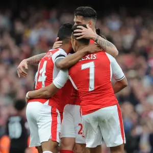 Theo Walcott celebrates scoring a goal for Arsenal with Alexis Sanchez and Granit Xhaka Theo Walcott celebrates scoring a goal for Arsenal with Alexis Sanchez and Granit Xhaka