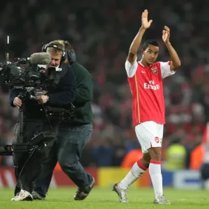 Theo Walcott claps the fans at the end of the match