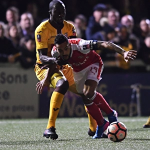 Theo Walcott Clashes with Kevin Amankwaah: Sutton United vs. Arsenal in The Emirates FA Cup Fifth Round