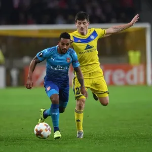 Theo Walcott Clashes with Stanislav Dragun and Igor Stasevich in Arsenal's UEFA Europa League Match against BATE Borisov Theo Walcott Clashes with Stanislav Dragun and Igor Stasevich in Arsenal's UEFA Europa League Match against BATE Borisov