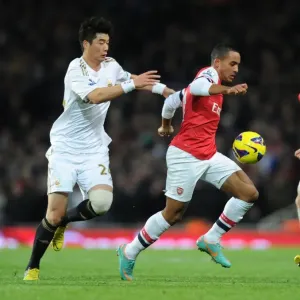 Theo Walcott Dashes Past Sung-Yueng Ki: Arsenal vs Swansea City, Premier League 2012-13 Theo Walcott Dashes Past Sung-Yueng Ki: Arsenal vs Swansea City, Premier League 2012-13