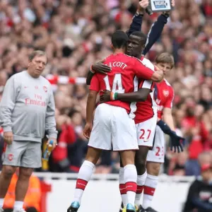 Theo Walcott and Emmanuel Eboue (Arsenal) Theo Walcott and Emmanuel Eboue (Arsenal)